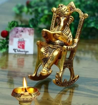 Golden Lord Ganesha Statue Sitting On A Rocking Chair Showpiece